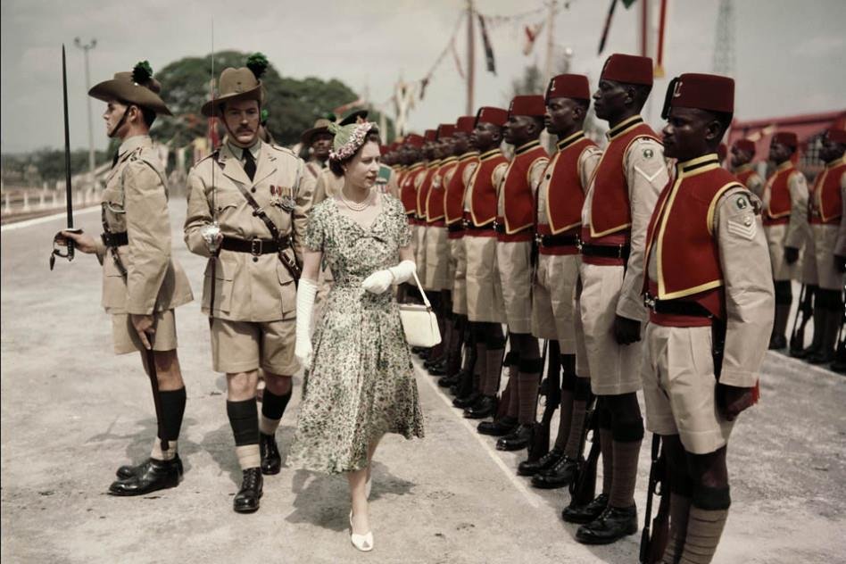 Queen Elizabeth II inspects men of the newly-renamed Queen’s Own Nigeria Regiment, Royal West African Frontier Force, at Kaduna Airport, Nigeria, during her Commonwealth Tour, February 2, 1956.